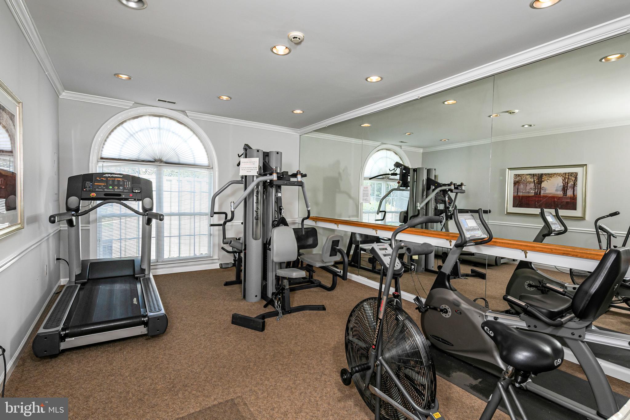 163 Federal Point Boulevard Lawrence Township, NJ 08648 - Photo 37 of 37 a view of a room with gym equipment