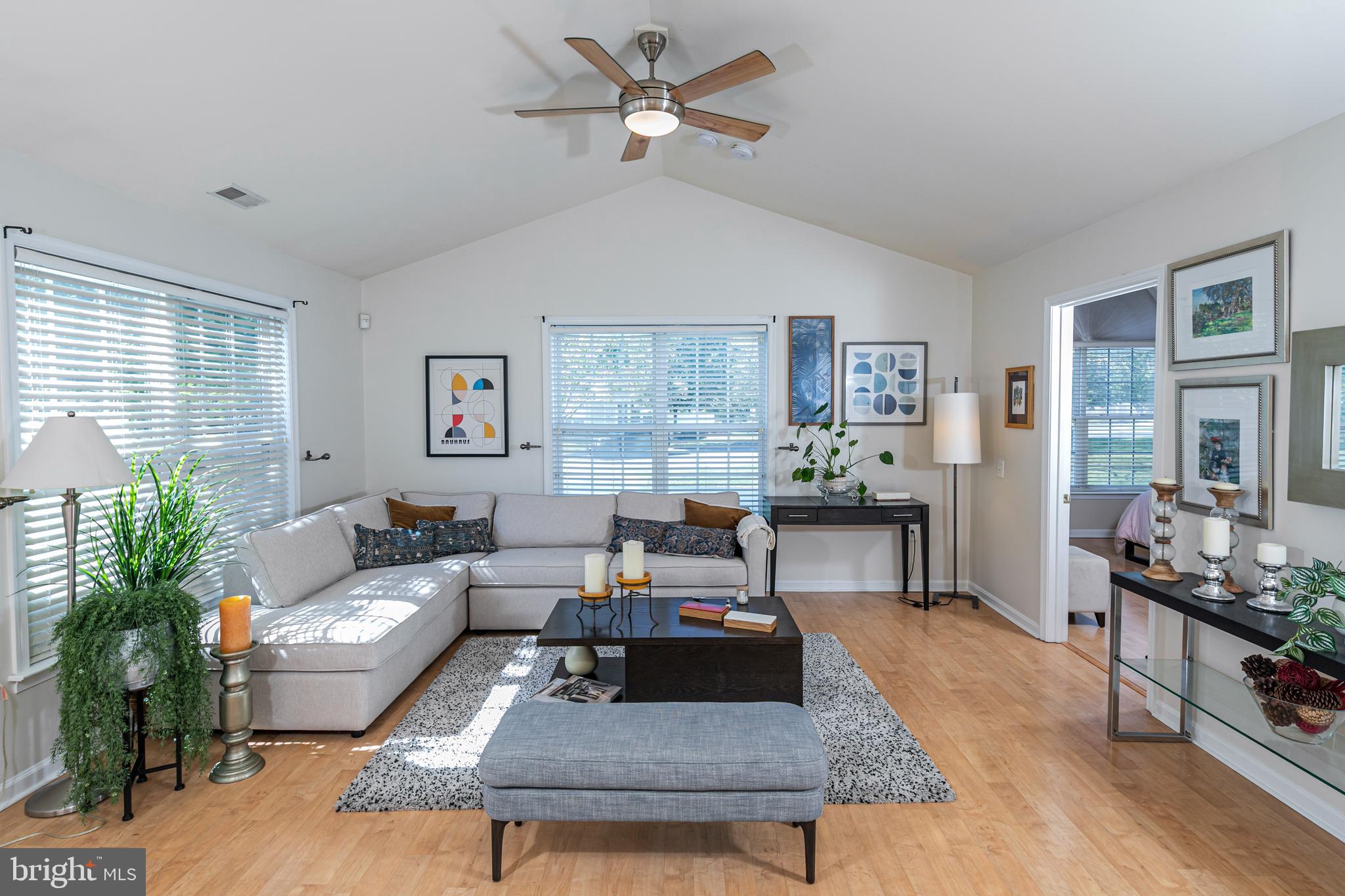 163 Federal Point Boulevard Lawrence Township, NJ 08648 - Photo 5 of 37 a living room with furniture and a large window