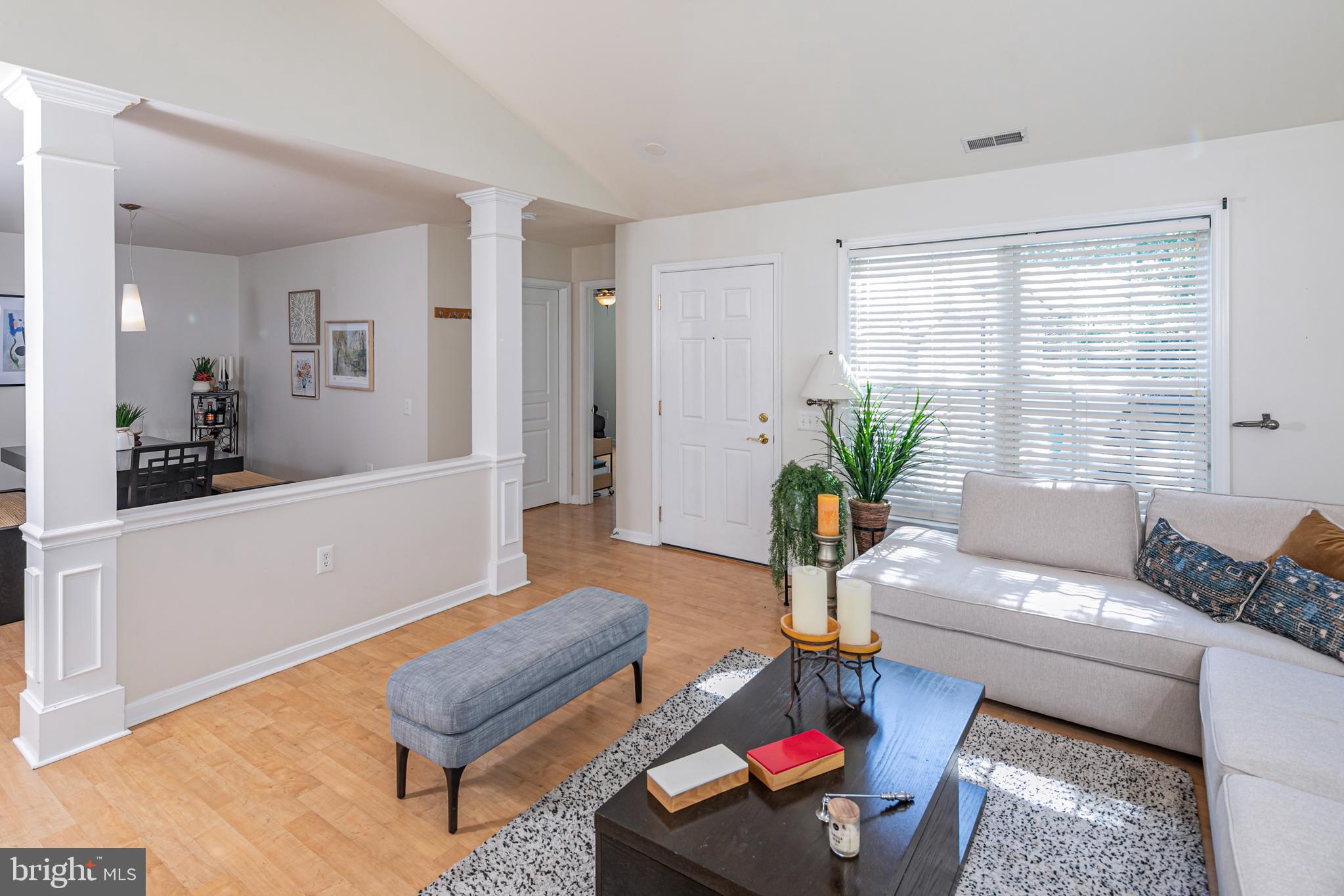 163 Federal Point Boulevard Lawrence Township, NJ 08648 - Photo 6 of 37 a living room with furniture and a potted plant