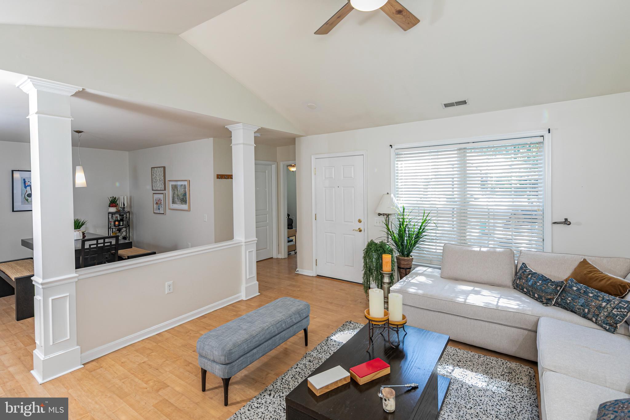 163 Federal Point Boulevard Lawrence Township, NJ 08648 - Photo 7 of 37 a living room with furniture and a large window