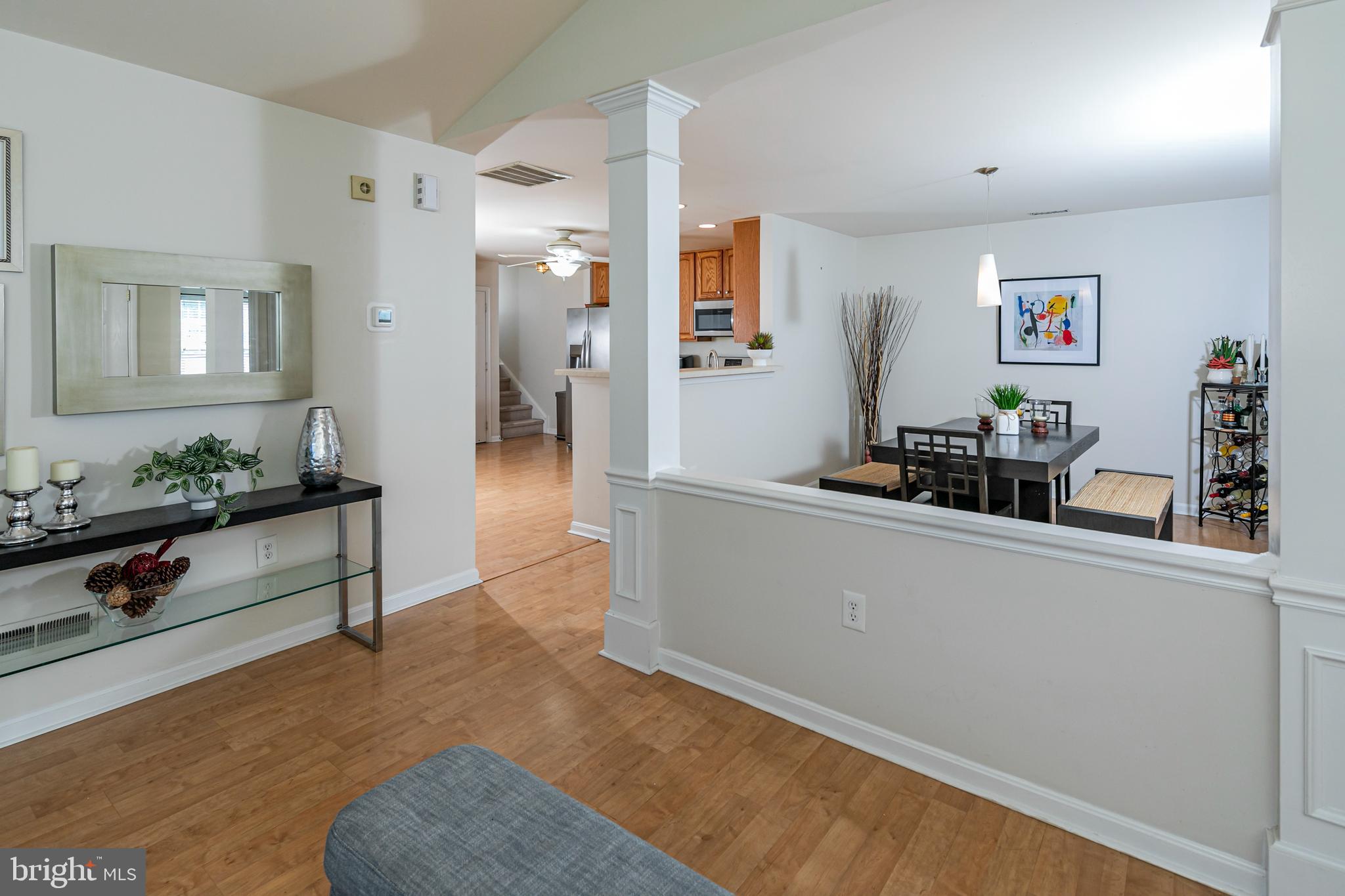 163 Federal Point Boulevard Lawrence Township, NJ 08648 - Photo 8 of 37 a living room with furniture and wooden floor
