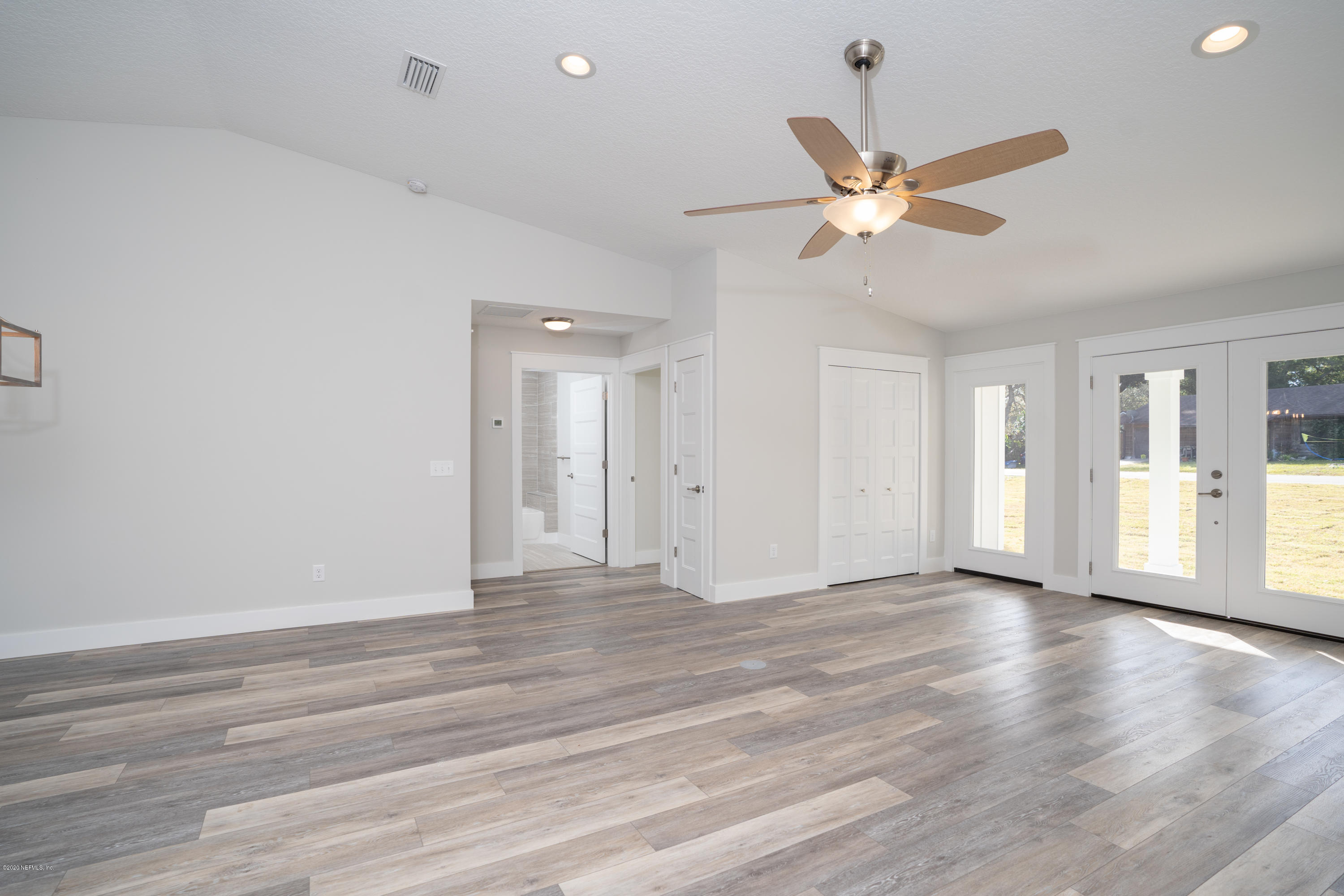 3464 Putnam Road St. Augustine, FL 32086 - Photo 10 of 39 31 Living room and entrance door