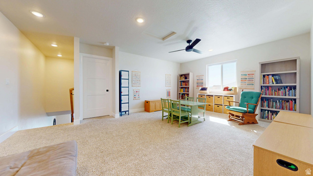 1127 4240 North Enoch, UT 84721 - Photo 32 of 56 Loft with light colored carpet, a ceiling fan, and recessed lighting