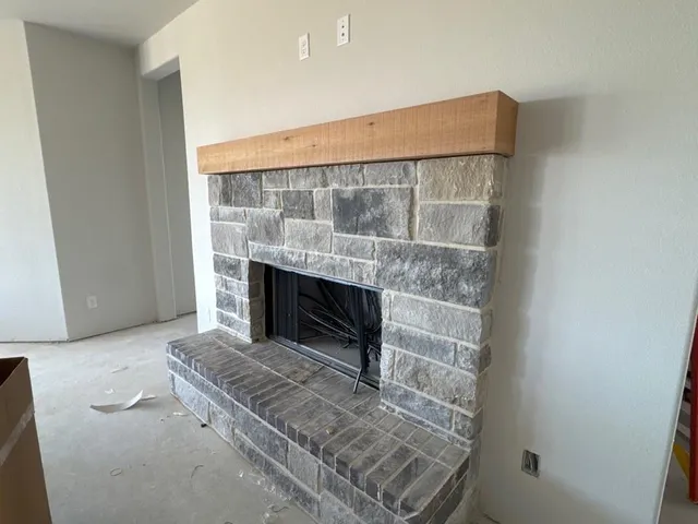 a living room with a fireplace