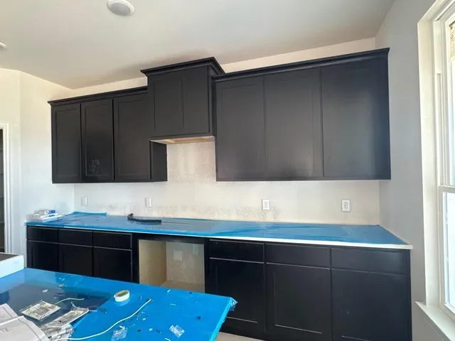 a bathroom with a sink vanity and a mirror