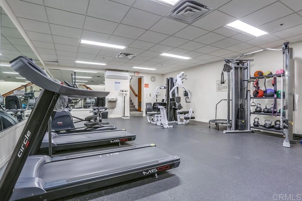 5875 Friars Road, Unit 4404 San Diego, CA 92110 - Photo 21 of 32 a view of a room with gym equipment