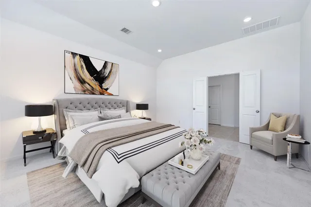 a bedroom with a bed and glass wall