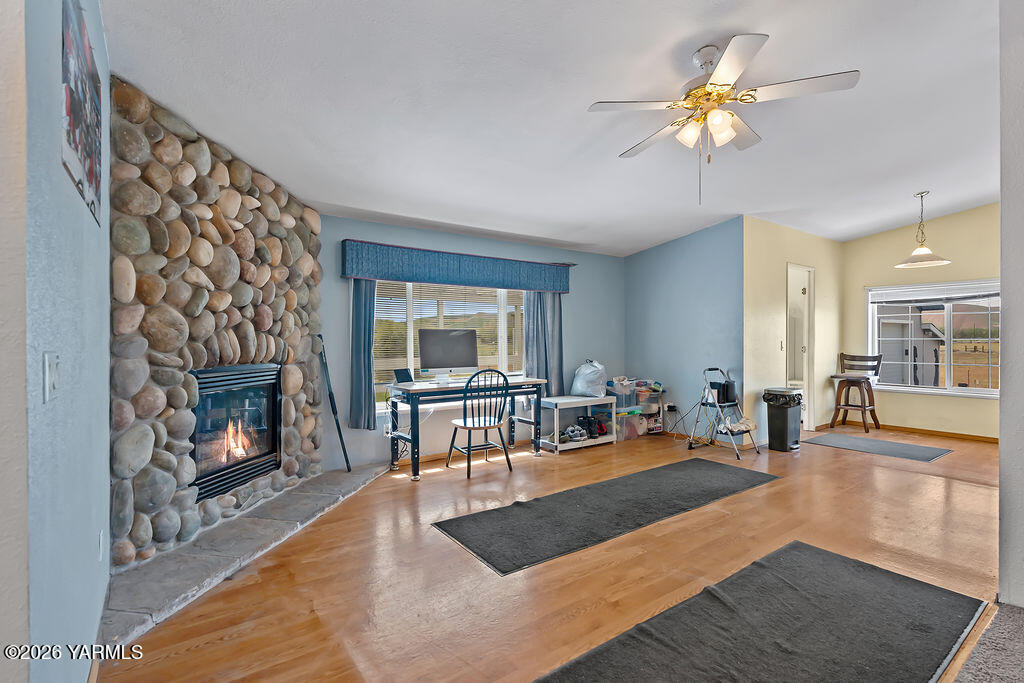 1550 Gibson Road Selah, WA 98942 - Photo 5 of 33 a living room with furniture and a fireplace