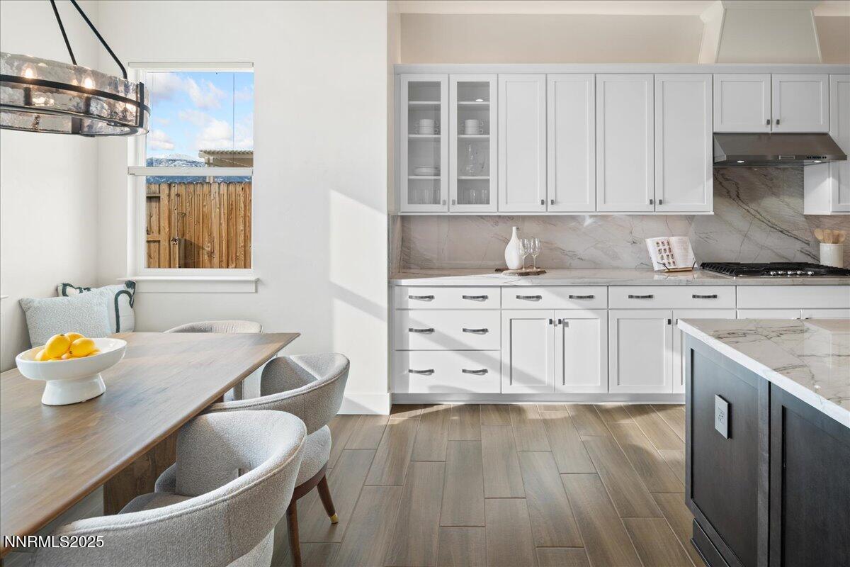 2330 Blushing Rock Drive Reno, NV 89521 - Photo 14 of 60 a kitchen with a sink cabinets and wooden floor