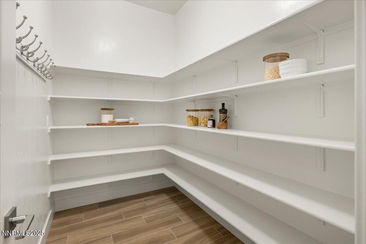 2330 Blushing Rock Drive Reno, NV 89521 - Photo 17 of 60 a view of walk in closet with empty racks