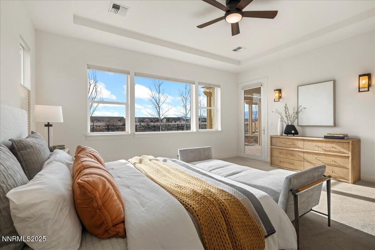 2330 Blushing Rock Drive Reno, NV 89521 - Photo 19 of 60 a bedroom with a bed and window