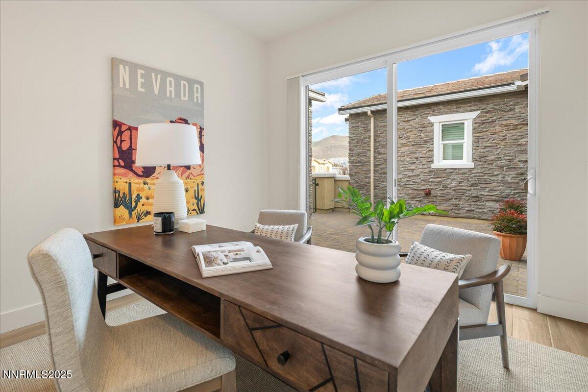 2330 Blushing Rock Drive Reno, NV 89521 - Photo 25 of 60 a view of a workspace with a table and chair