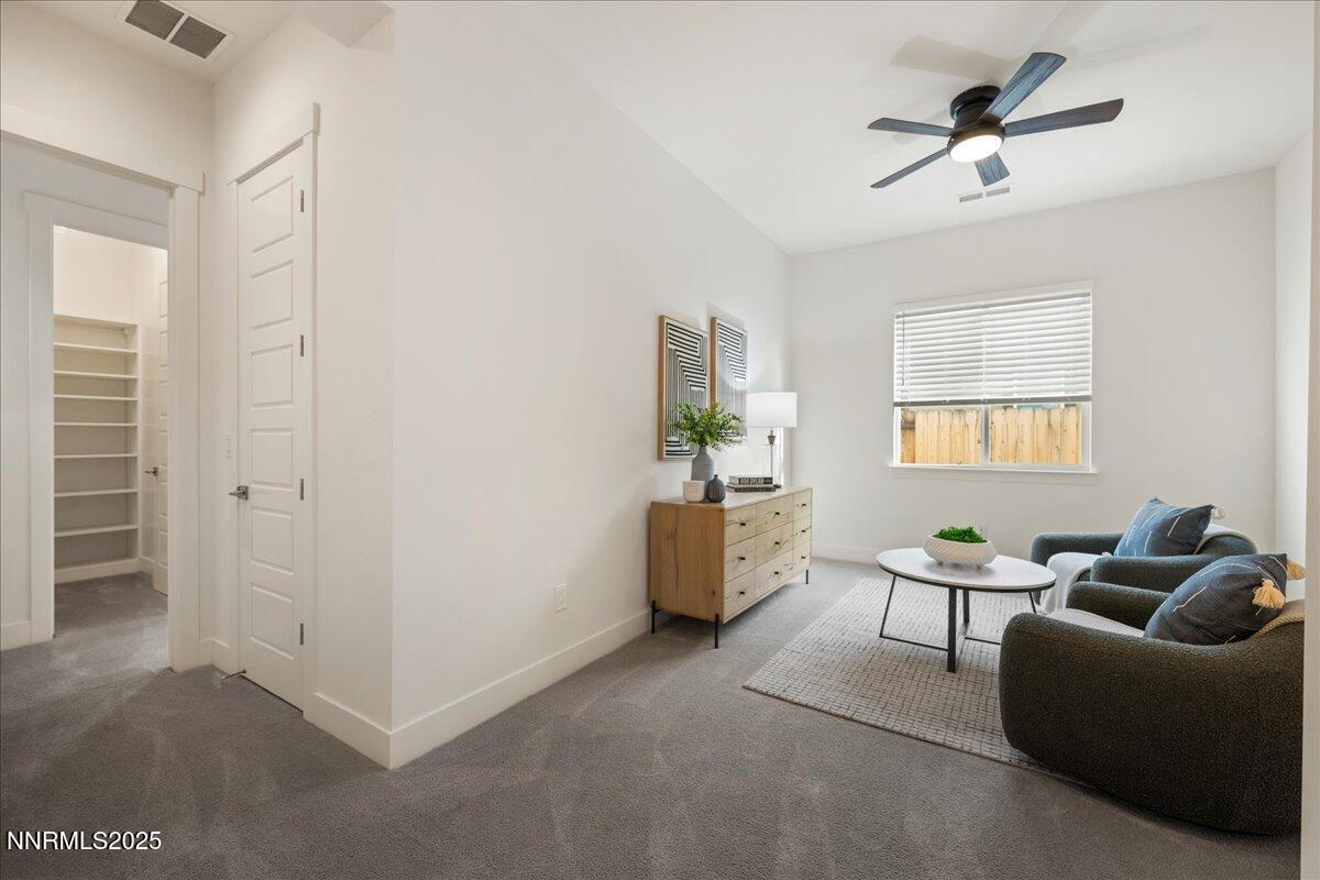 2330 Blushing Rock Drive Reno, NV 89521 - Photo 28 of 60 a living room with furniture and a window