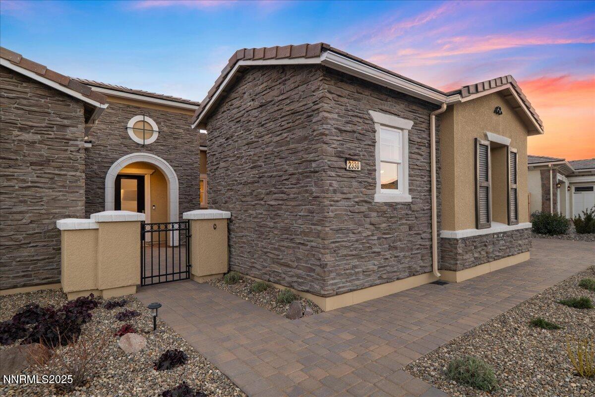 2330 Blushing Rock Drive Reno, NV 89521 - Photo 3 of 60 a front view of a house with parking