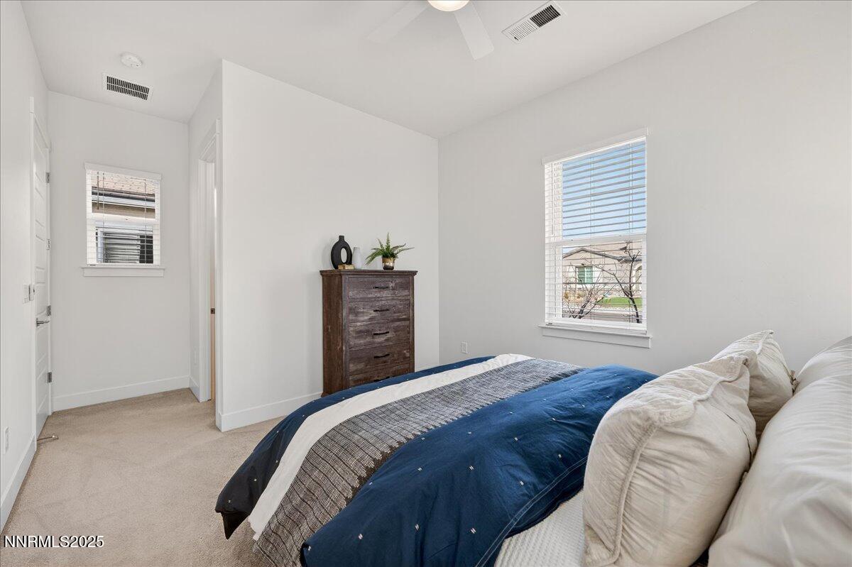 2330 Blushing Rock Drive Reno, NV 89521 - Photo 31 of 60 a bedroom with a bed and a window