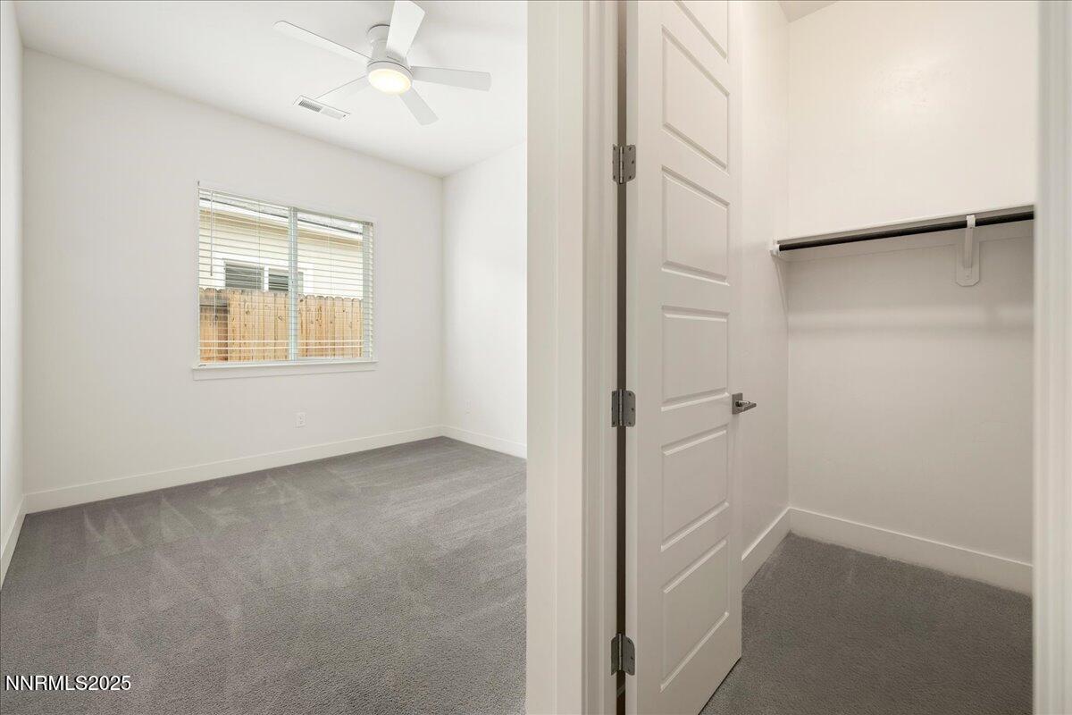 2330 Blushing Rock Drive Reno, NV 89521 - Photo 34 of 60 an empty room with windows and closet