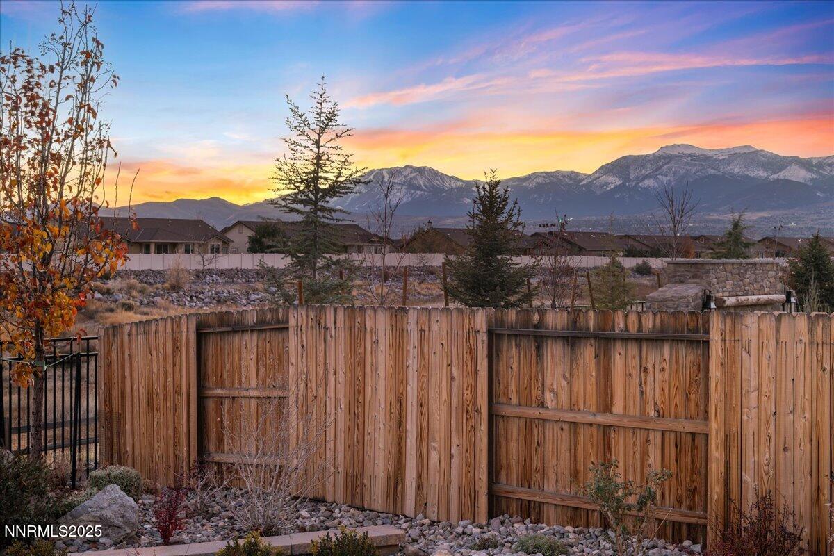 2330 Blushing Rock Drive Reno, NV 89521 - Photo 48 of 60 a view of a house with a yard and mountain view