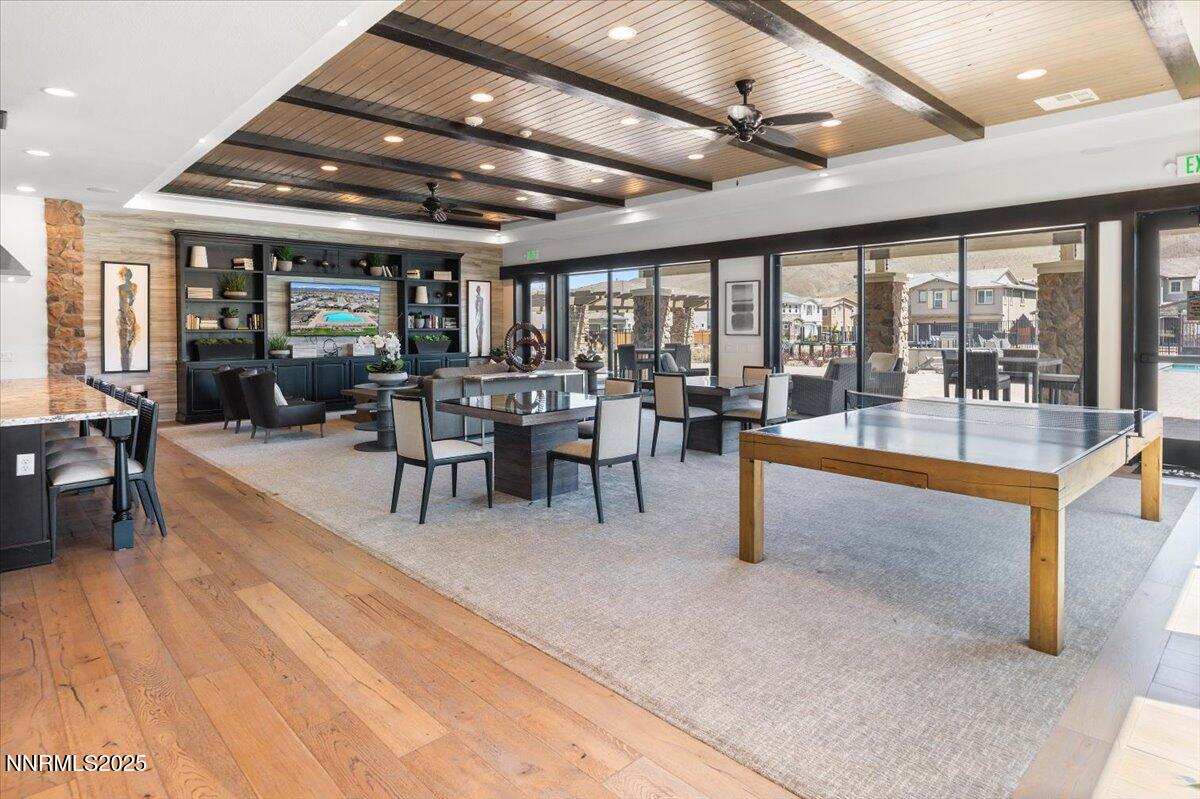 2330 Blushing Rock Drive Reno, NV 89521 - Photo 57 of 60 a living room with furniture a flat screen tv and a large window