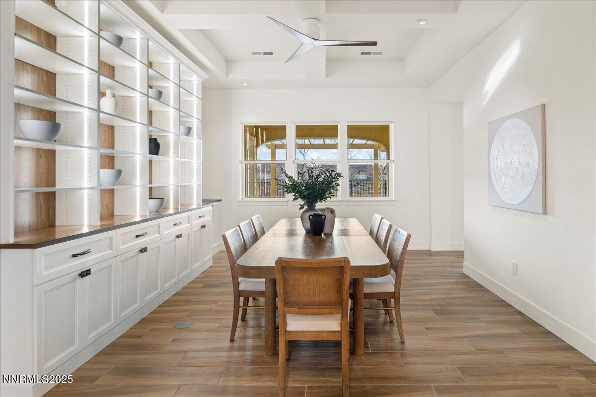 2330 Blushing Rock Drive Reno, NV 89521 - Photo 6 of 60 a view of a dining room with furniture and wooden floor