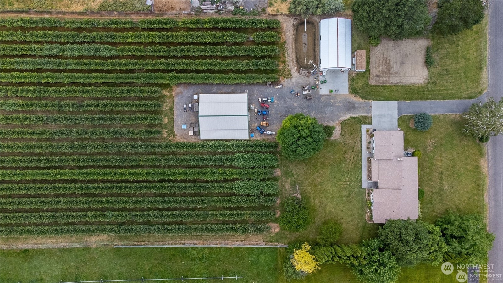 1659 West Gillis Road Othello, WA 99344 - Photo 2 of 36 an aerial view of a house with a yard