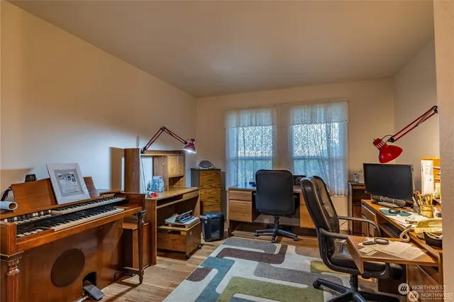 a bathroom with a sink and a washing machine