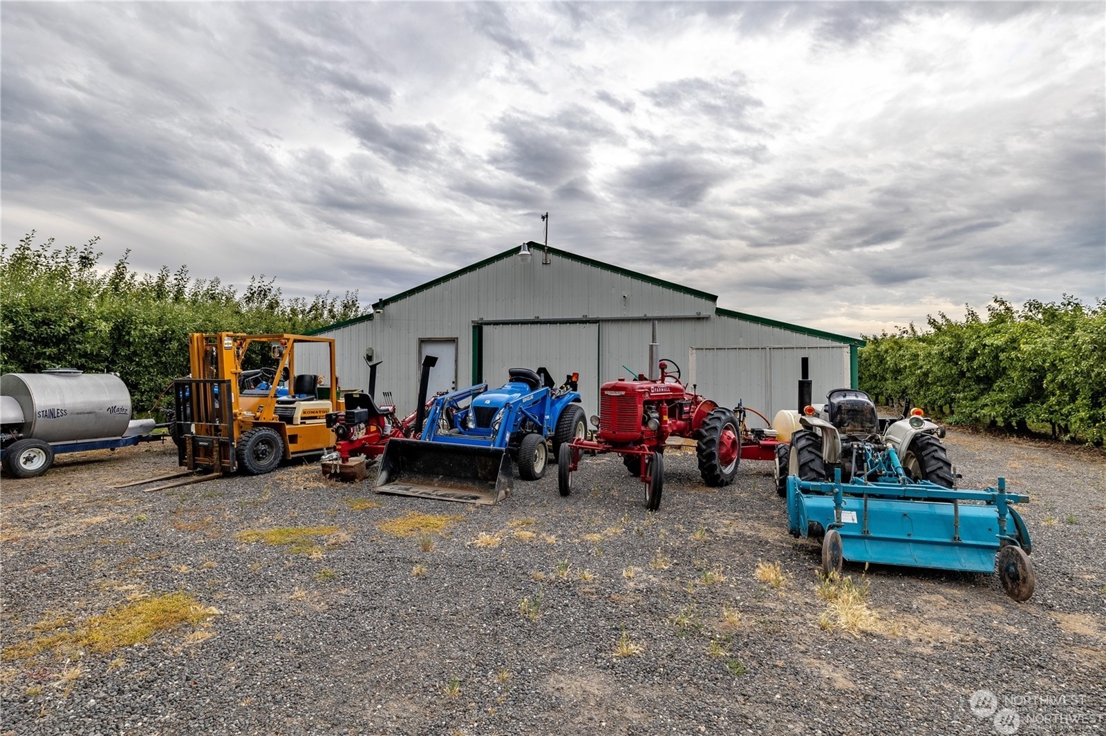 1659 West Gillis Road Othello, WA 99344 - Photo 32 of 36 a view of a car in the back yard of a house