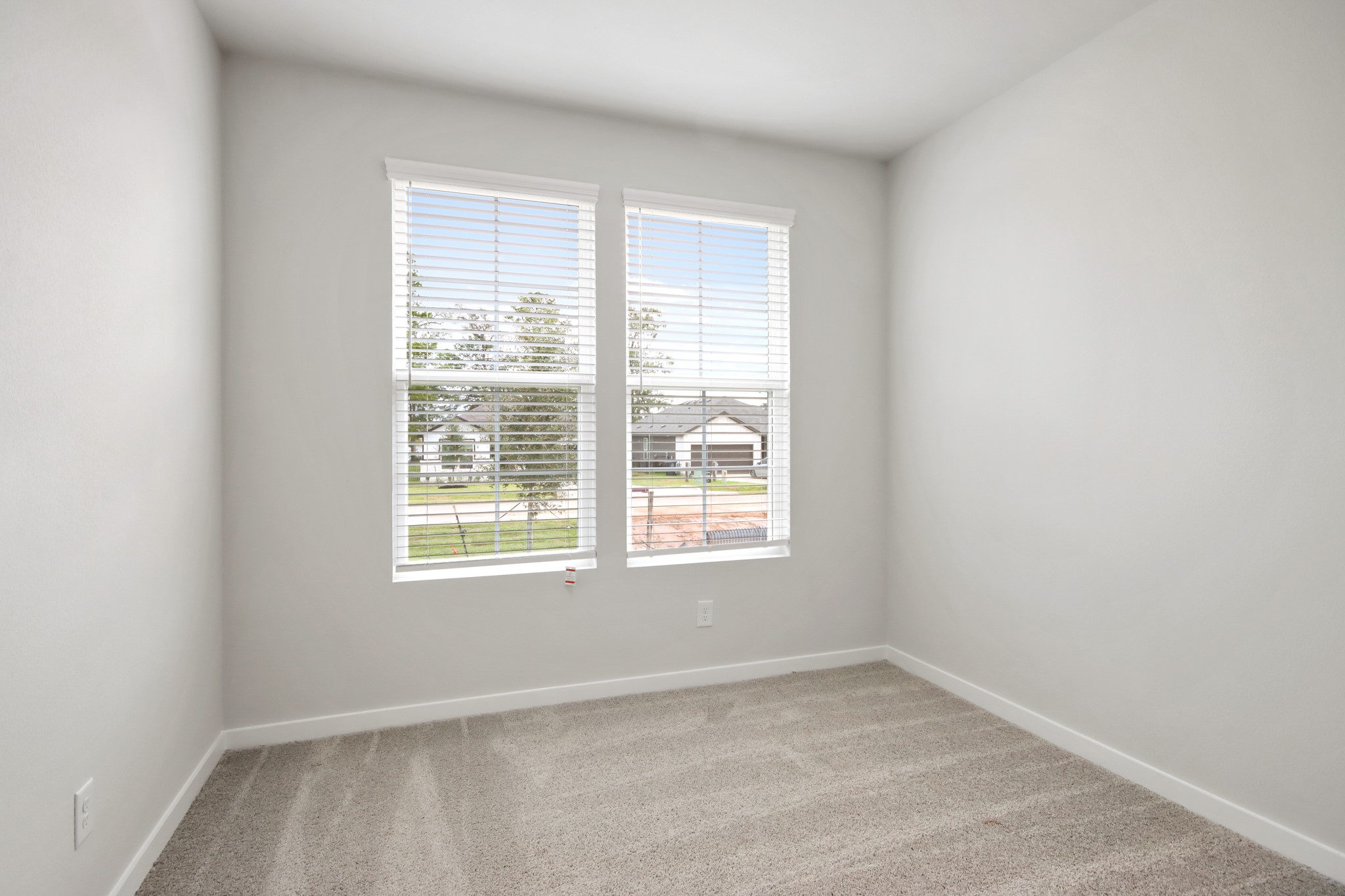 4533 Wisenbaker Way Bryan, TX 77845 - Photo 15 of 25 a view of an empty room with a window