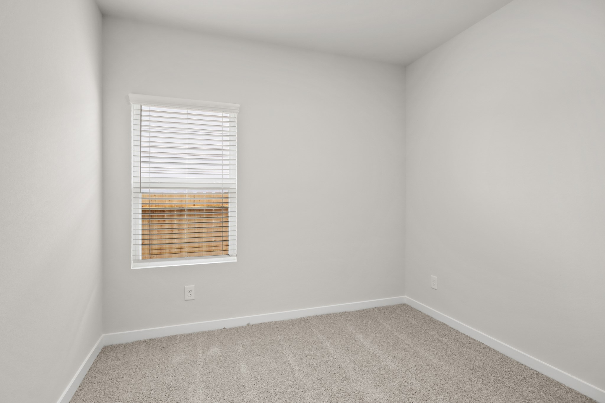 4533 Wisenbaker Way Bryan, TX 77845 - Photo 16 of 25 a view of an empty room with a window