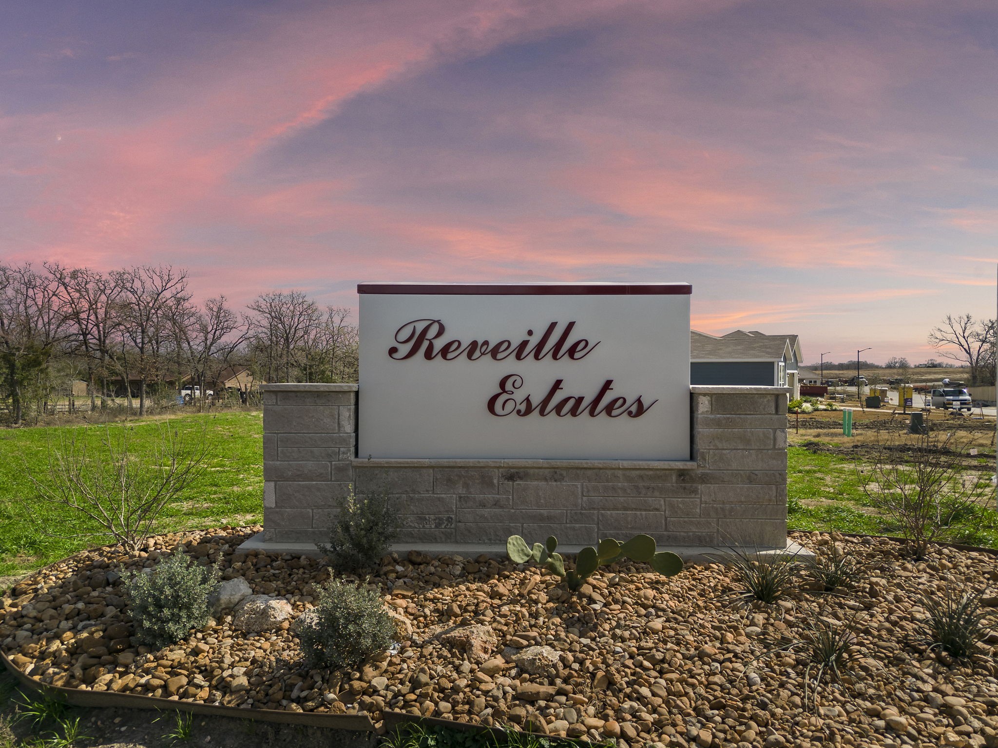 4533 Wisenbaker Way Bryan, TX 77845 - Photo 23 of 25 a sign that is sitting on a brick wall