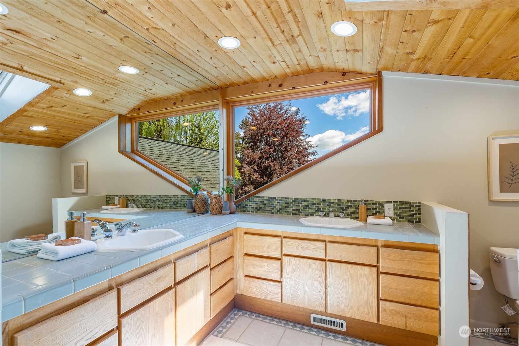 5337 South Kenyon Street Seattle, WA 98118 - Photo 20 of 37 a kitchen with stainless steel appliances granite countertop a sink and a stove