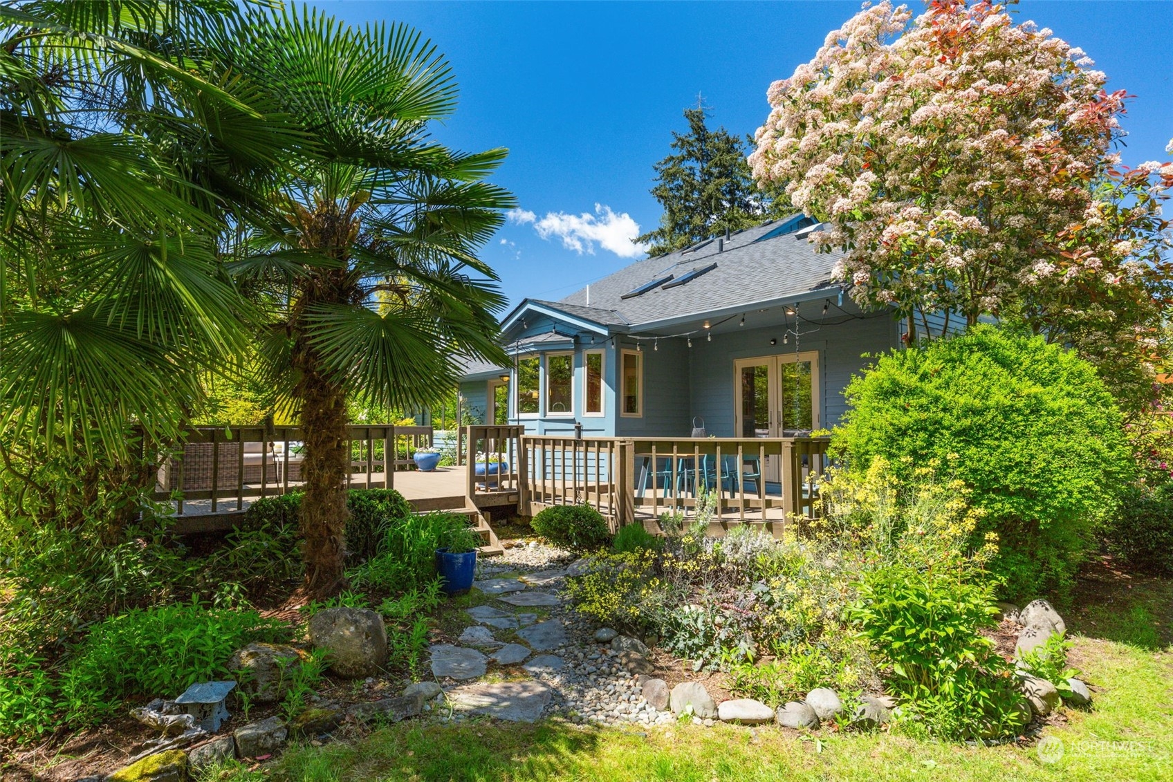 5337 South Kenyon Street Seattle, WA 98118 - Photo 28 of 37 a house with lots of trees