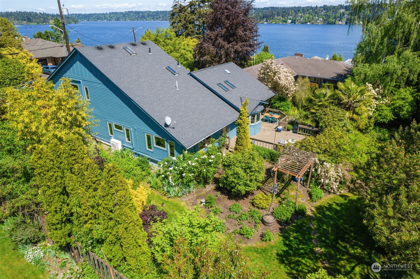 5337 South Kenyon Street Seattle, WA 98118 - Photo 34 of 37 an aerial view of a house with yard and outdoor space