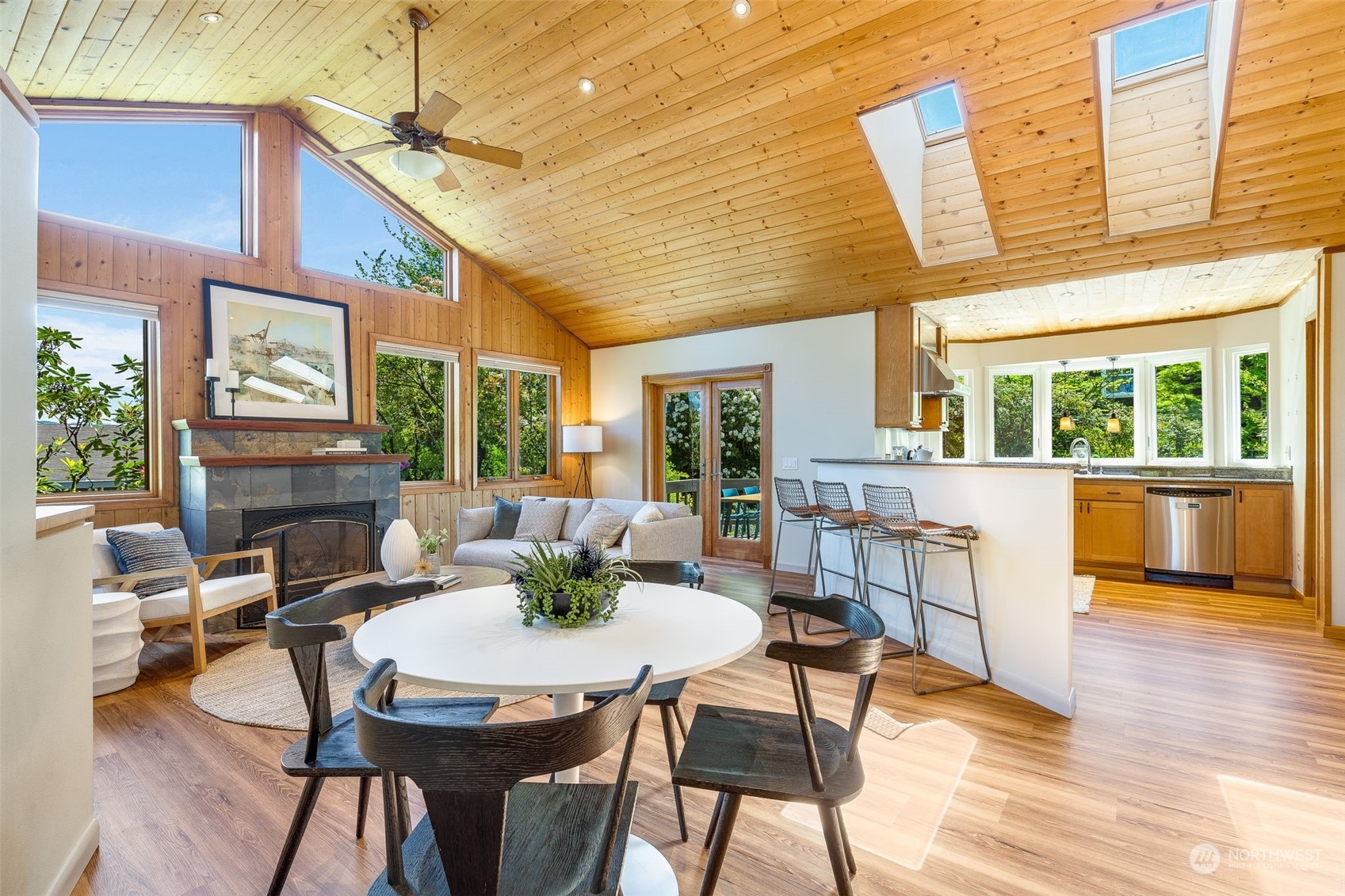 5337 South Kenyon Street Seattle, WA 98118 - Photo 5 of 37 a view of a dining room with furniture window and wooden floor