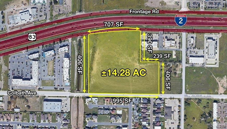 a front view of a building with parking area