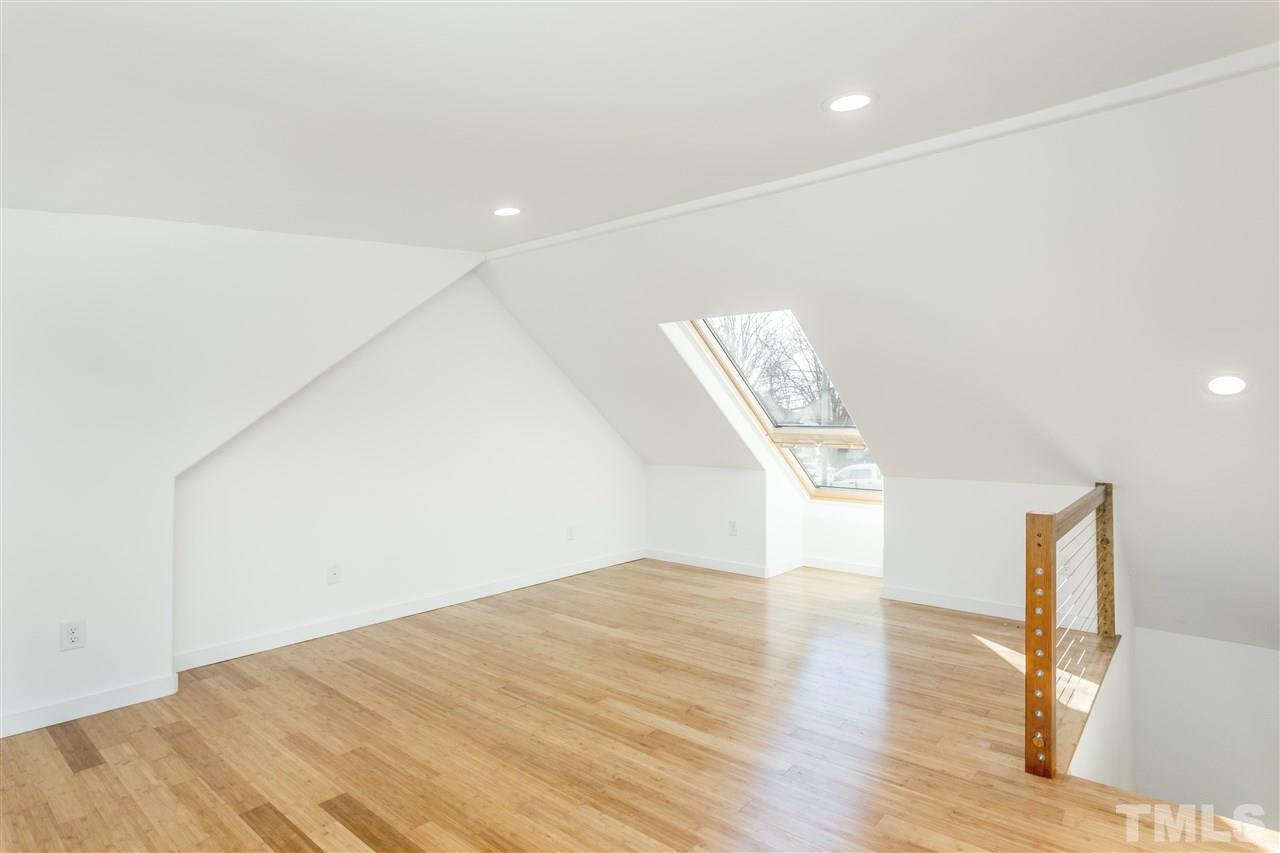 208 Bledsoe Avenue Raleigh, NC 27601 - Photo 6 of 16 Large open second floor loft perfect for office or yoga studio. Has large drop out window that brings the outside in. Fantastic view of downtown skyline.