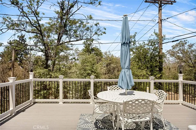 a view of a balcony with chairs