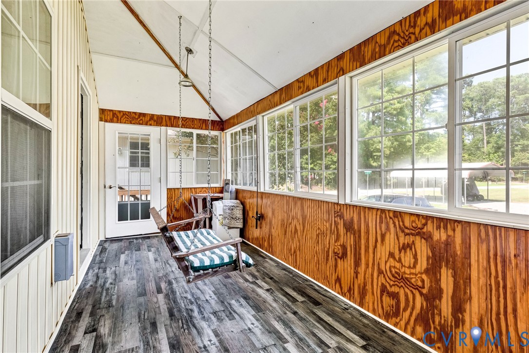 233 Washington Street Reedville, VA 22539 - Photo 21 of 35 Bright sunroom featuring expansive multi-pane wind