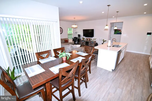 a bedroom with a bed and a television