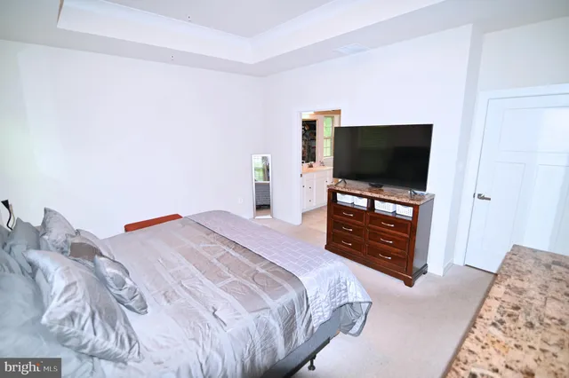 a bathroom with a double vanity sink and mirror