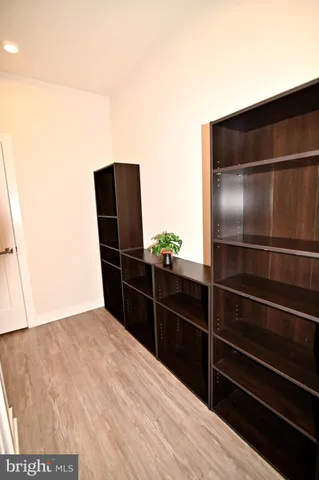 a room with furniture and air hockey table