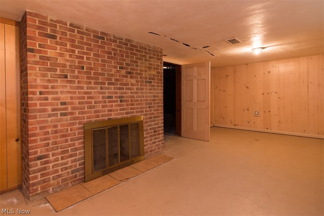 30200 Smithfield Road Chagrin Falls, OH 44022 - Photo 23 of 27 Brick-hearth fireplace in the lower level.