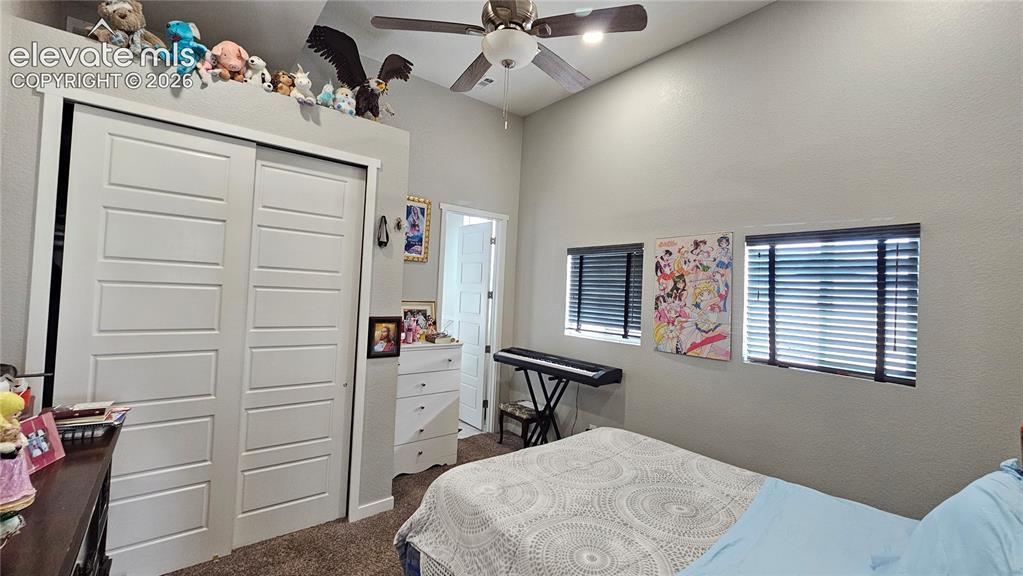 3835 Sengbeil Road Yoder, CO 80864 - Photo 22 of 48 a bedroom with a bed and a dresser