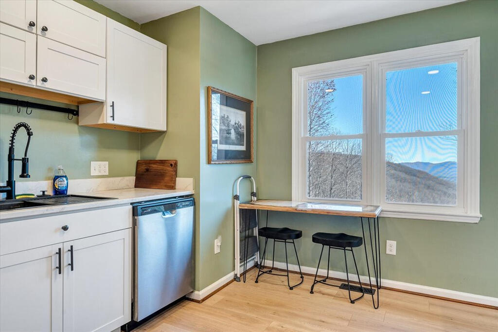 1039 Fosters Knob Road Blue Ridge, VA 24064 - Photo 12 of 45 a work place with cabinets and wooden floor