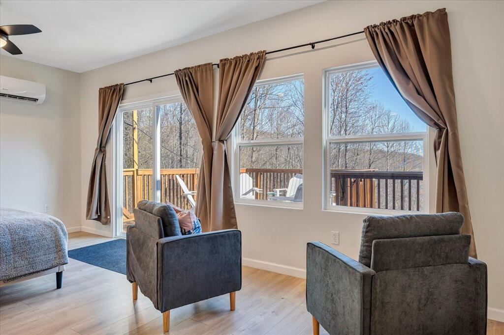 1039 Fosters Knob Road Blue Ridge, VA 24064 - Photo 24 of 45 a living room with furniture and a window
