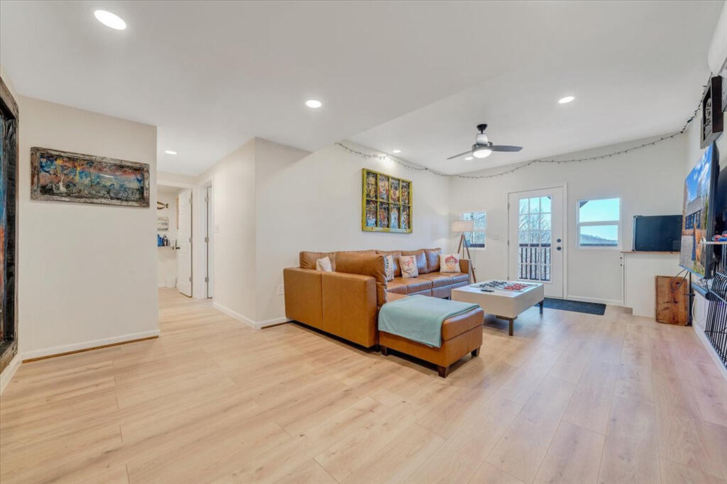 1039 Fosters Knob Road Blue Ridge, VA 24064 - Photo 30 of 45 a living room with furniture and wooden floor