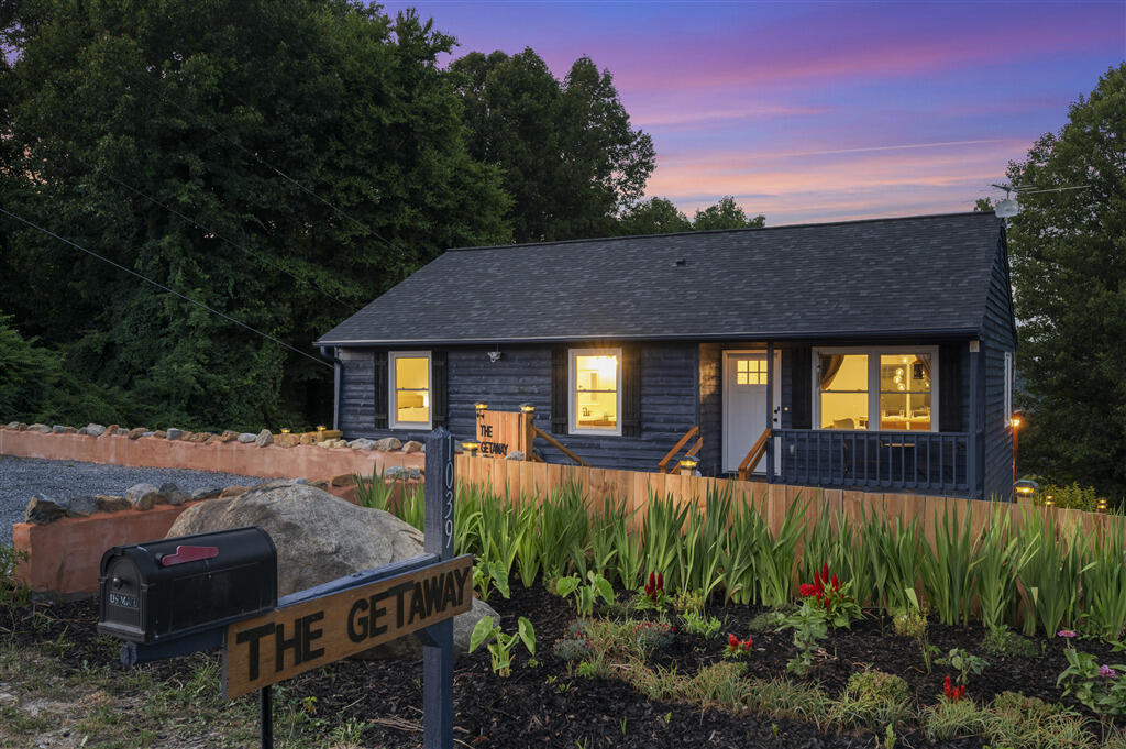 1039 Fosters Knob Road Blue Ridge, VA 24064 - Photo 38 of 45 a view of a house with backyard and sitting area