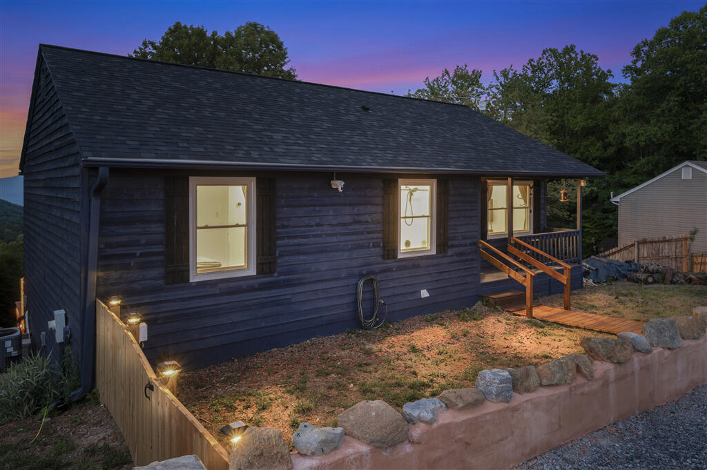 1039 Fosters Knob Road Blue Ridge, VA 24064 - Photo 40 of 45 a brick building with a bench in front of it