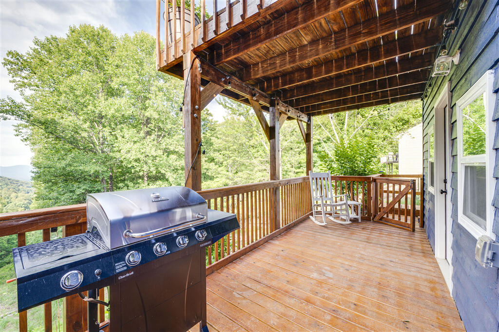 1039 Fosters Knob Road Blue Ridge, VA 24064 - Photo 44 of 45 a view of chairs and deck in the backyard