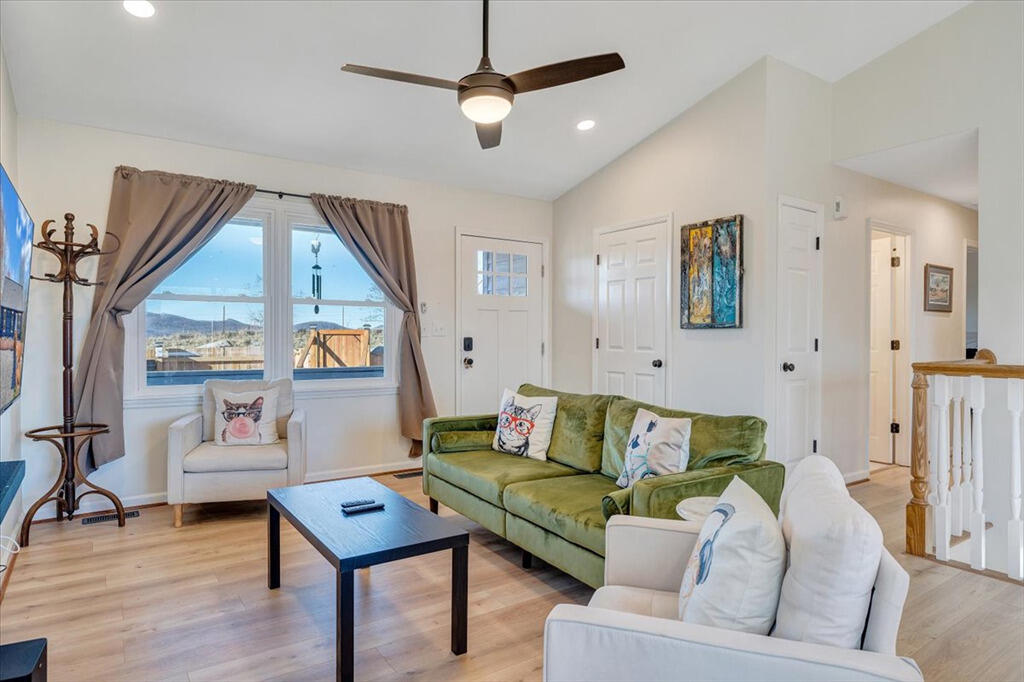 1039 Fosters Knob Road Blue Ridge, VA 24064 - Photo 5 of 45 a living room with furniture and a large window