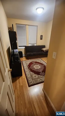 a living room with a rug